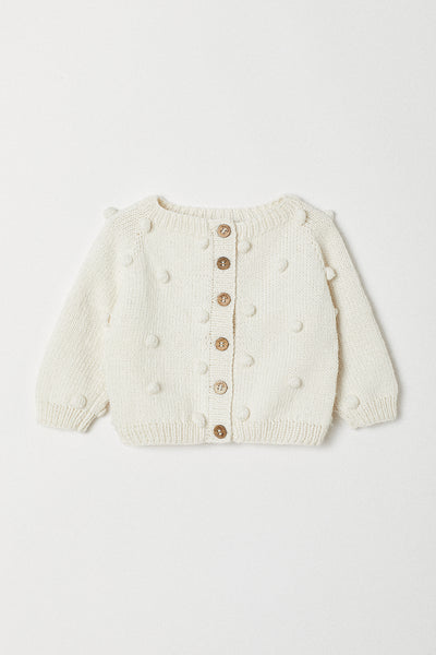 Handknitted Pom Pom Cardigan | White | Made with Organic Cotton Yarn